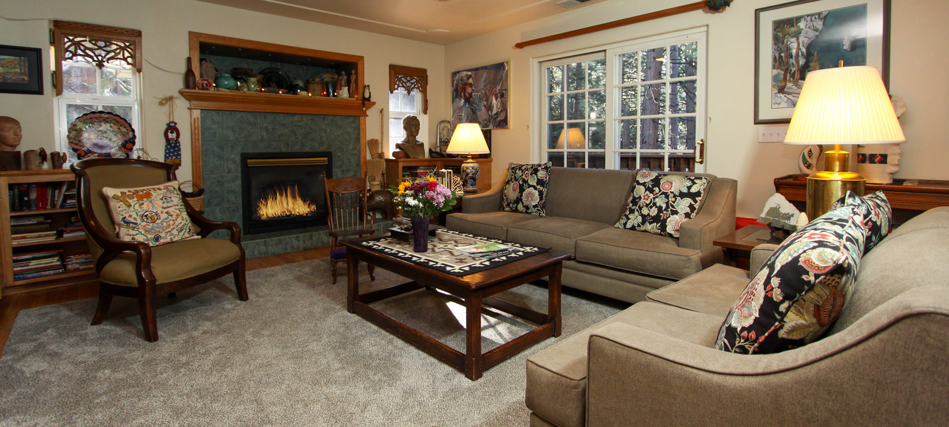 mccaffrey house living room at sunrise with fireplace and couches